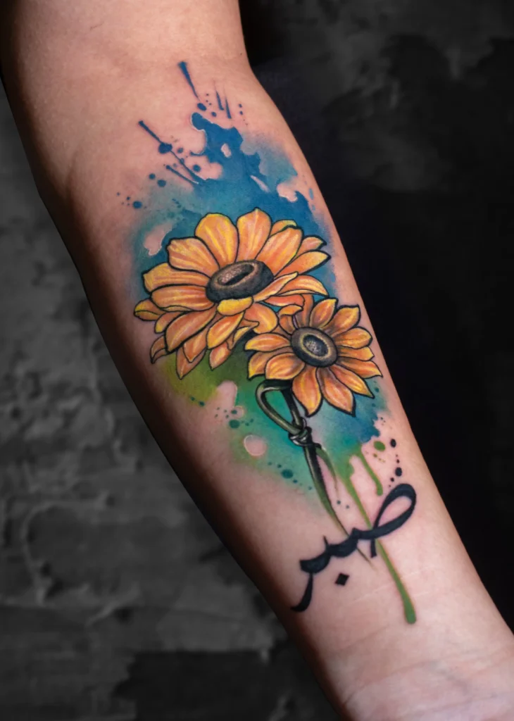 watercolour Sunflower tattoo by Satish Dorwekar at colour core tattoos Pune